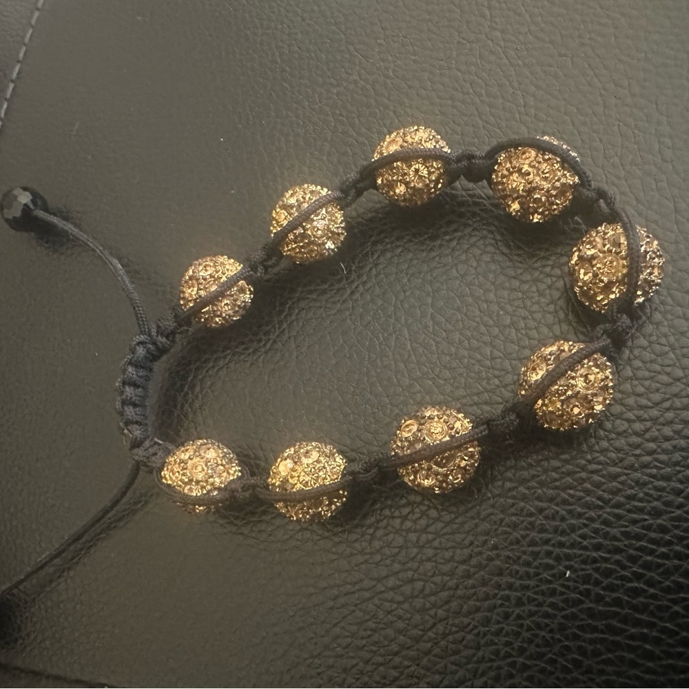 Sleek Black and Gold Shamballa